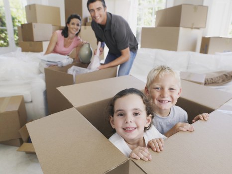 Removals team handling boxes during a London house move