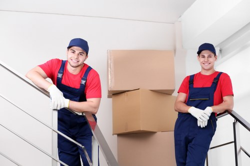 Packed moving boxes and supplies in a London home