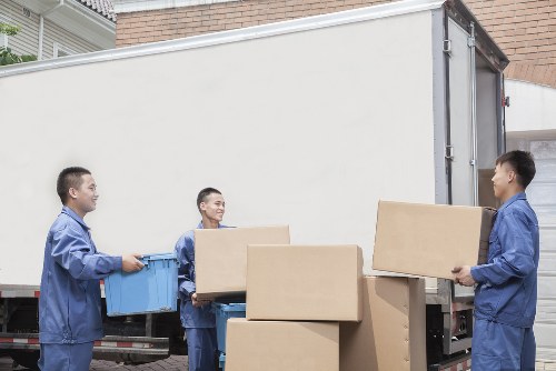 Furniture being loaded into a van in London
