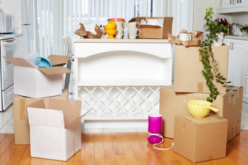 Professional movers transporting office furniture in London