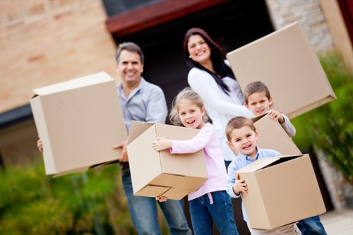 Unpacking household items in a new London property