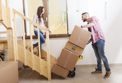 Crew carrying out a risk-aware moving process in a residential property